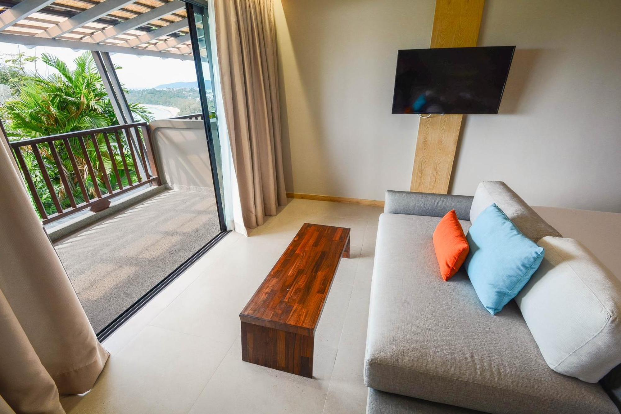 Andaman Cannacia Resort & Spa - Sha Extra Plus Strand Kata Exterior foto A living room at the resort